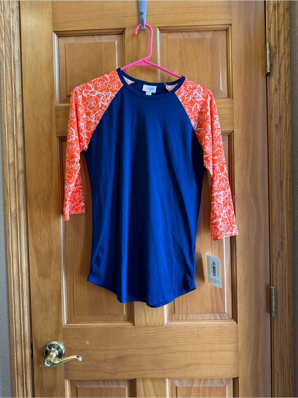 LuLaRoe Randy Navy with Orange Floral Raglan Sleeves